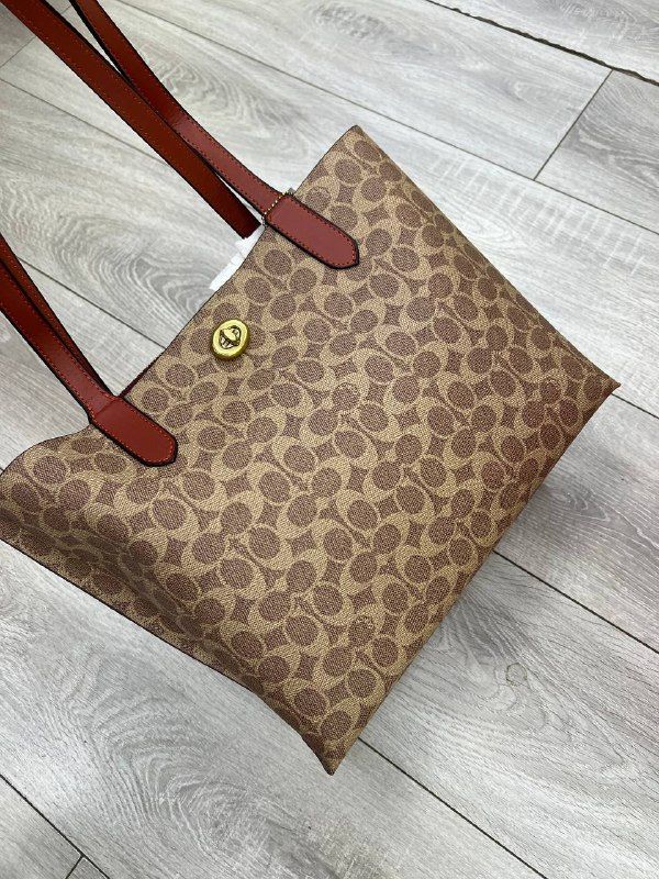 Coach — из натуральной кожи
