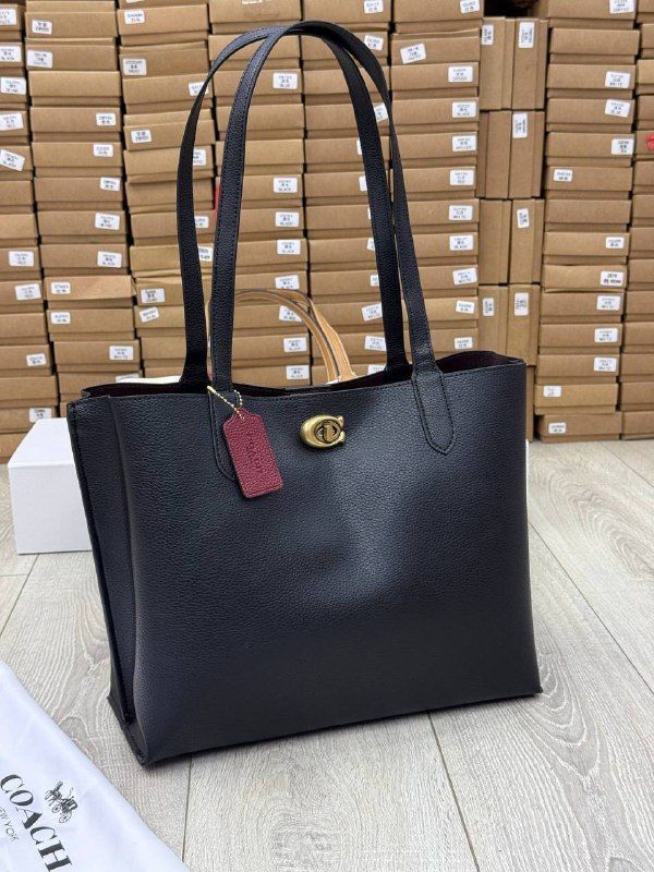 Coach — из натуральной кожи